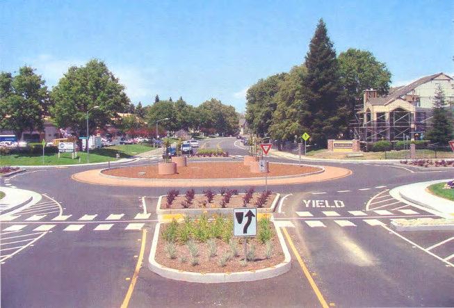 ROUNDABOUT (SINGLE-LANE) Like traffic circles, roundabouts require traffic to circulate counterclockwise around a center island.