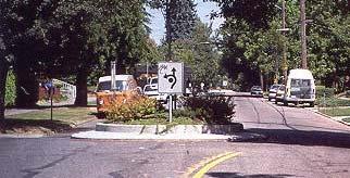 To bridge the gap between the sidewalk and raised crosswalk, a metal connector plate shall be used as shown in the image to the right.