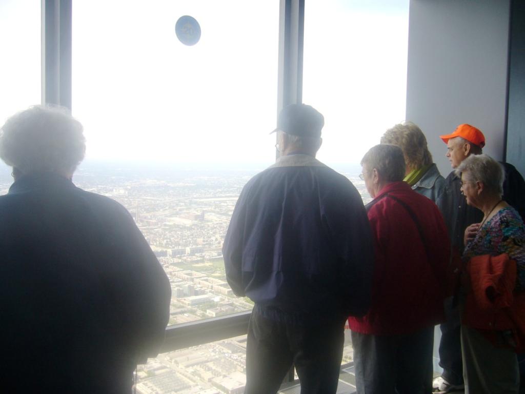 ON TOP OF WILLIS (SEARS) TOWER THERE ARE GLASS LEDGES THAT YOU CAN WALK OUT ON AND LOOK STRAIGHT DOWN. YIKES!