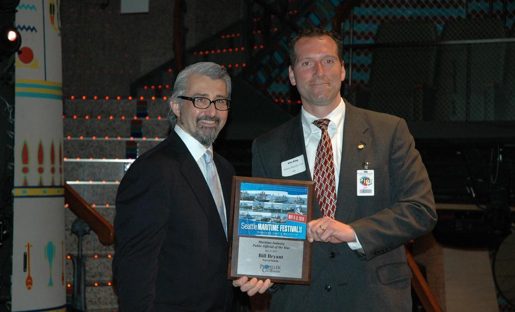 Bill Bryant, Commission President, Port of Seattle, receives the Public