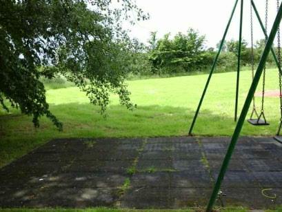 8 - Low Risk (Finding 1) Item: Swings - 1 Bay 2 Seat (Flat) Risk Level: L - Low Risk Manufacturer: Wicksteed Playgrounds Surface: Rubber Tiles The tree canopy