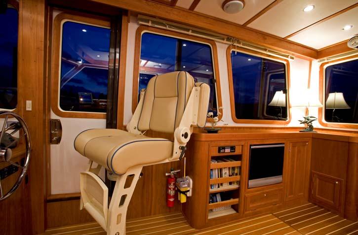 The side door includes a sliding screen which rolls up on the aft side.
