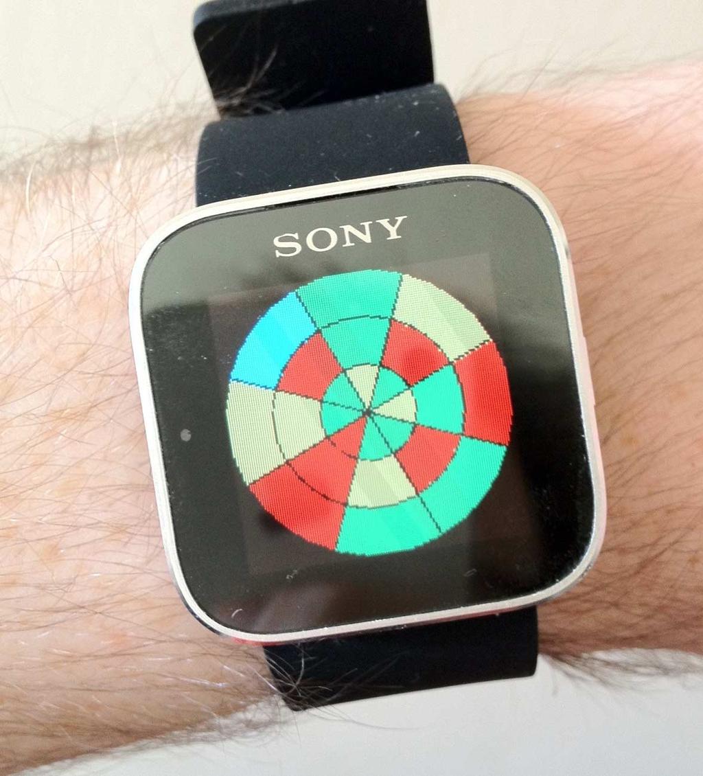 Figure 4: The RunNav visualisation shown on a Sony SmartWatch. The watch's 3.5cm screen acts as a secondary display for a Bluetooth connected Android smartphone.