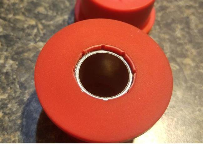 Fig. 17 Washer goes in each end of the poly bushings on LCAs after the sleeve is inserted. Fig.