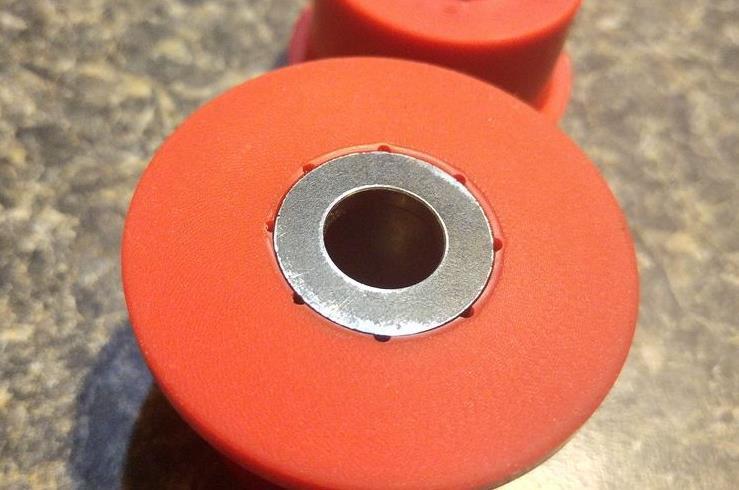 upright (for the RUCA-o). If the grease fitting interferes with the bushing and keeps it from seating all the way, you can notch the edge of the bushing with a razor blade to clear the fitting.