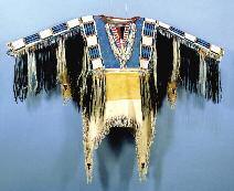 This is Kicking Bear s shirt restored by Cathy Smith. ter of a traditional Lakota medicine man and Sun Dance leader on the Cheyenne River Sioux Reservation.