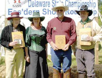 Match Winners (l r) Top Delaware Lady ~ Hazel Pepper, Top Lady Competitor ~ Dancin Angel, Top Overall Shooter ~ Cody Conagher, Top Delaware Cowboy ~ Cool Hand Lee pay homage to the early epics that