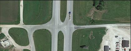 Figure 9.3 shows aerial and street view images of a four-leg stop-controlled intersection.