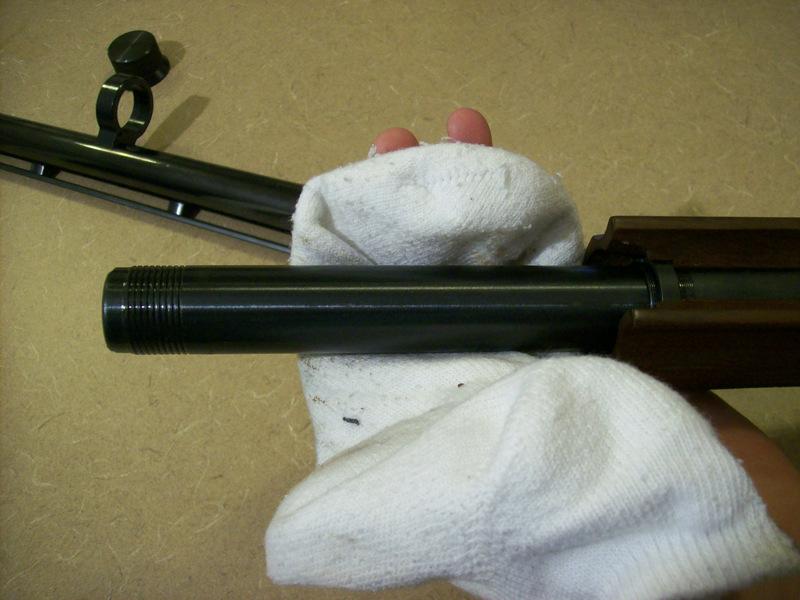 Use the rag to wipe down the magazine originally covered by the fore grip.