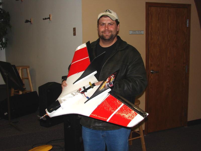 Lots of planes showed up at the March meeting. Paul Doyle had an electric plane that was not typical for him. It was a nice-looking J-3 Cub done in traditional colors, on floats.