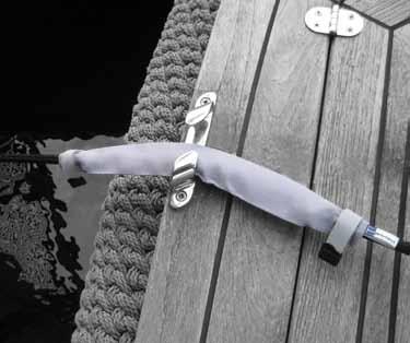 Reinforced with nylon webbing Adjustable straps attach to the guard rail Shock cord sewn within the straps allows some give Chafe guard for your mooring lines.