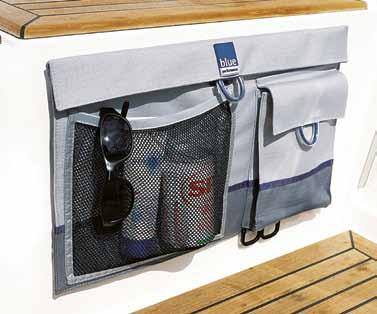 Attach and remove using Blue Performance screw-in hooks Flap with Velcro closure A mesh pouch stitched to the front Two D-rings for attaching small