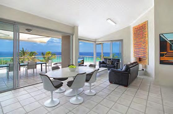 Huge outdoor terrace captures wide ocean views Three good sized bedrooms, two with water views Top floor position in small