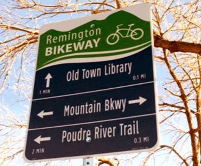 These signs can direct users to nearby facilities including trails and bike lanes, as well as other community resources and amenities.