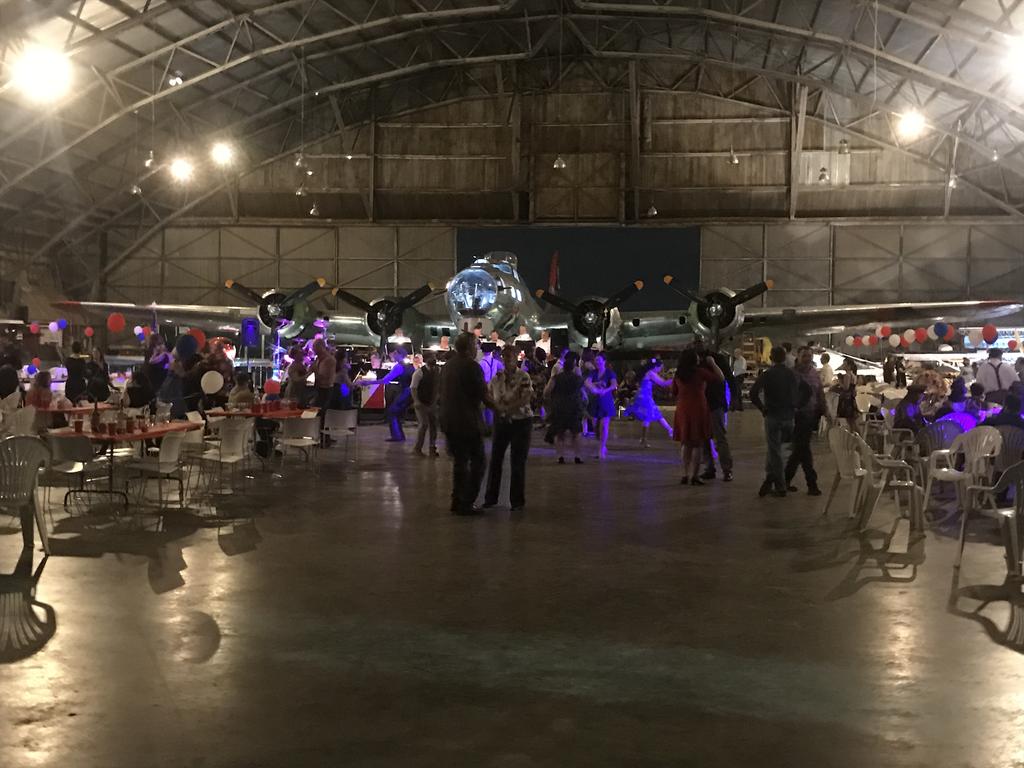 27th Annual Big Hangar Dance Vintage Flying Museum Dinner and Dance at Meacham Field was held on Oct. 21, 2017. There was a B-17 on display along with a brass band.