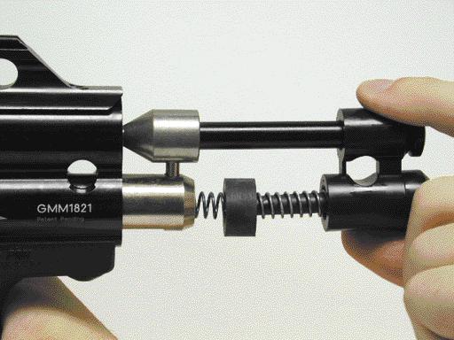 Figure 13 Bolt-hammer assembly removed. LUBRICATION It is recommended that a 100% synthetic gun oil, such as PMI Paintball Gun Oil, be used for lubricating the marker. 1. Before each insertion of the removable power source (tank or remote line) into the ASA, clean the threads and put two drops of oil onto them.