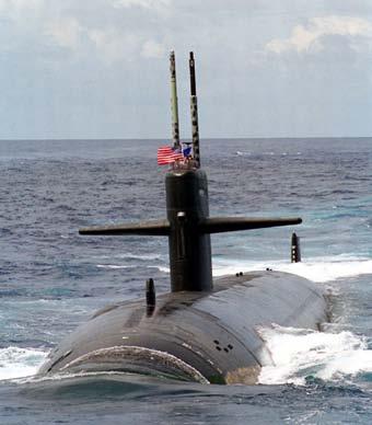 aircraft carrier submarine The navy uses many ships and boats, large and small. Submarines move under the water.