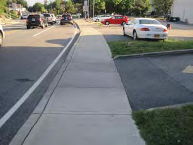 Driveways: Continue the sidewalk material across driveways to alert drivers to the presence of the sidewalk and potential people walking.
