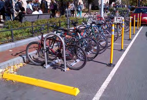 o Space to secure the frame and one or both wheels to the rack. o Keeps bicycle wheels on the ground. o Contains no sharp edges or protruding elements.