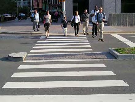 B. Marked Crosswalks Marked crosswalks alert drivers to locations where pedestrians may cross and encourage people to cross in a consistent location.