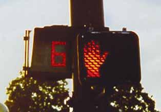 New meaning of flashing upraised hand when pedestrian countdown signals are present was NOT ADOPTED Ped may enter the intersection on the flashing upraised hand when a