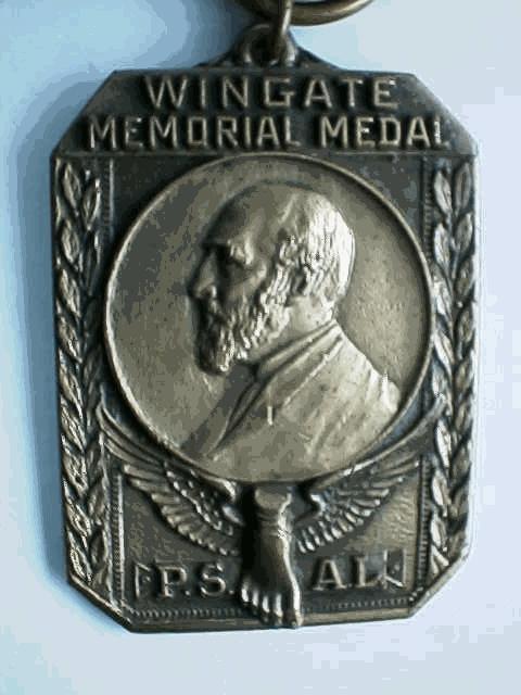 WINGATE MEMORIAL MEDAL 1965 Awarded to Juan Lieba of Charles Hughes High School "FOR THE/BEST RECORD/IN ATHLETIC/ IMPROVEMENT/SCHOOL WORK/ AND CHARACTER" GEORGE C.