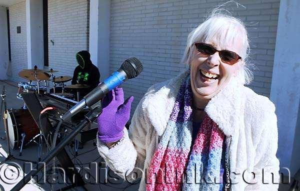 Dotti Leichner is seen moments after being asked to again test the microphone.