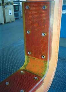 Contoured profiles, such as those used for carrying coils, eliminate any damage to the product