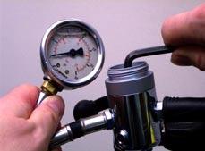 If your test gauge does not have an over pressure relief valve, you must also attach a proplery adjusted second stage to the first stage to act as the relief valve in case of a HP
