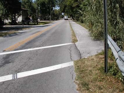 Crosswalk and Lane Markings Findings Crosswalk markings and outside lane markings are faded or missing in many school walk zones reviewed in this Study.