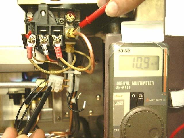 If the oil temperature is below 180 C and the overtemp is still open circuit then the overtemp is faulty. If no spark at all can be generated, remove piezo ignitor and hold close to cabinet body.