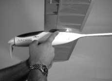 The center of gravity (CG) of your Ascent should be 2 3 8" behind the leading edge of the wing at the fuselage.
