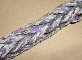 Powdery areas or fused yarns internally are probably caused by excessive cycle loading, overloading and/or internal yarn against yarn abrasion.