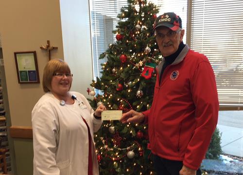 MORE KMCC DONATIONS Kermit Schulz donating a check from