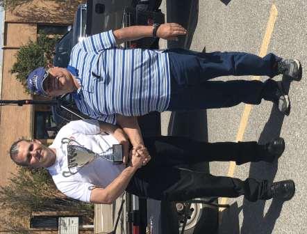 (ABOVE) Car Show Co-Chairperson, Kevin Hammack awards Jack Broussard of Louisiana the Best in