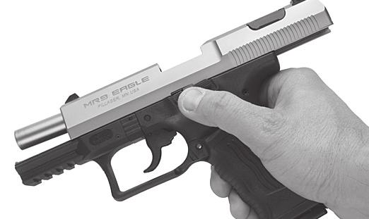 2.4.4 Slide Stop Locking the slide in the open position: Grasping the grip of the frame and with your finger off the trigger and outside the trigger guard, depress the magazine release, and