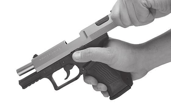 Grasp the serrated sides of the slide from the rear with the thumb and fingers (3.6 Fig.