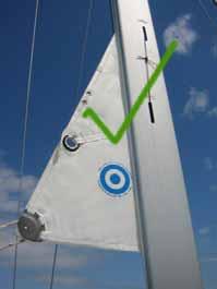This is designed as a marker that will indicate when the mainsail is furled inside the mast enough so that the U.V. cover on both sides of the sail will protect the sail.