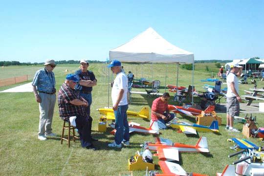 looping at the same time. People brought canopies for shade and lined up their planes.