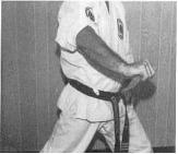 Basic Stance The side slash (backhanded): the knife is held so that it extends out