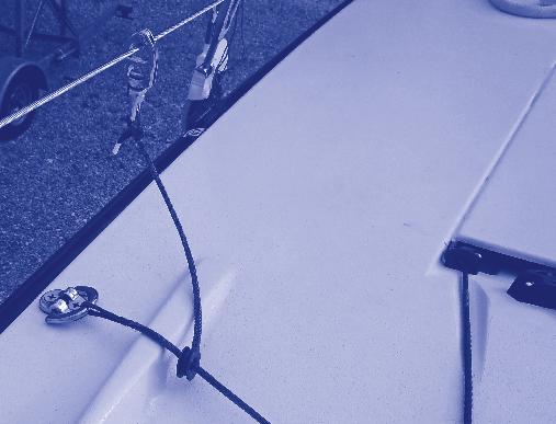 A line is spliced to the starboard side outboard lead pad-eye.