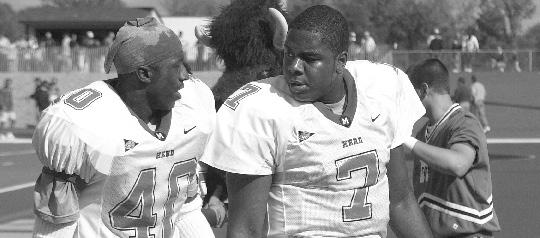 RECEIVING RECORDS The 2002 Thundering Herd set several school receiving and passing records, thanks in large part to standouts Darius Watts (left) and Byron Leftwich.