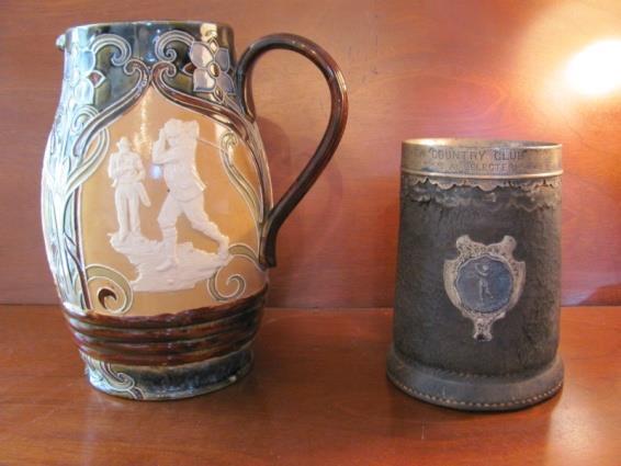 10. Outstanding 9 ½ Lambeth Pitcher by Royal Doulton, the Pitcher has raised ceramic cream color golf scenes, the condition is outstanding Sale price @ $1,495 11.