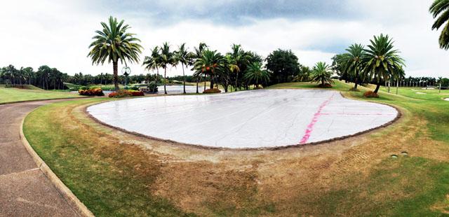 Photographed June 2013, the putting green at TIGC is seen here covered with a plastic tarp and being fumigated before being regrassed with TifEagle bermudagrass.