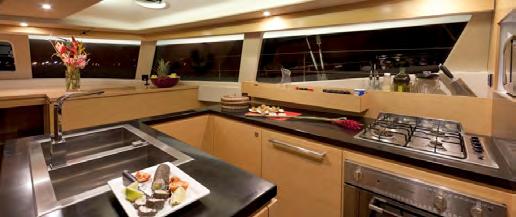 Among the equipment in the galley area are an Ice maker, an American Fridge and Freezer, Oven with a stainless steel hob with two stainless steel sinks and a commercial standard dishwasher.