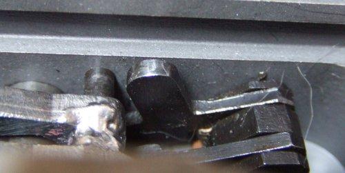 Left: VZ-58 disconnector which disengages the sear from