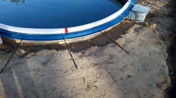 Fiberglass pool concrete beam We still use the concrete beam on our fiber glass pools, with a concrete pool deck our beam is 12 tall and 12 wide with rebar ran around the outside of the pool.