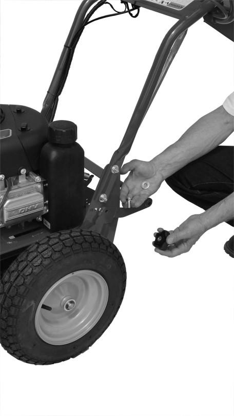 At this point, the Rear Axle Swing Arm of the mower is free to move up and down, allowing the rear height of cut position to be changed. The forward most hole in the adjuster is Position 6 (High).