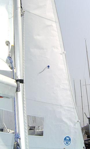 The mainsail is very important in helping steer the upwind. The skipper should always hold his mainsheet and be ready to ease it out quickly when he feels an increase in his weather helm (i.e. load on the helm acts as a brake.