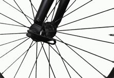 If rubbing is present, open the quick release and re-seat the wheel by applying downward pressure to the frame and fork with one hand so the wheel properly seats into the fork.